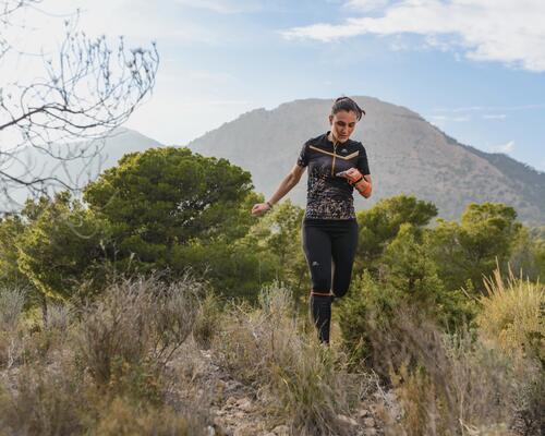 Woman runs in south forest 