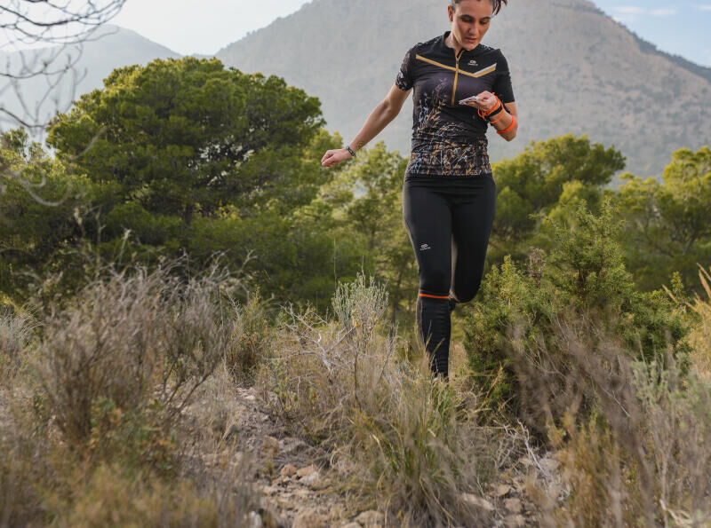 Woman runs in south forest