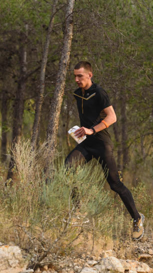 Man runs in the forest Man runs in the forest