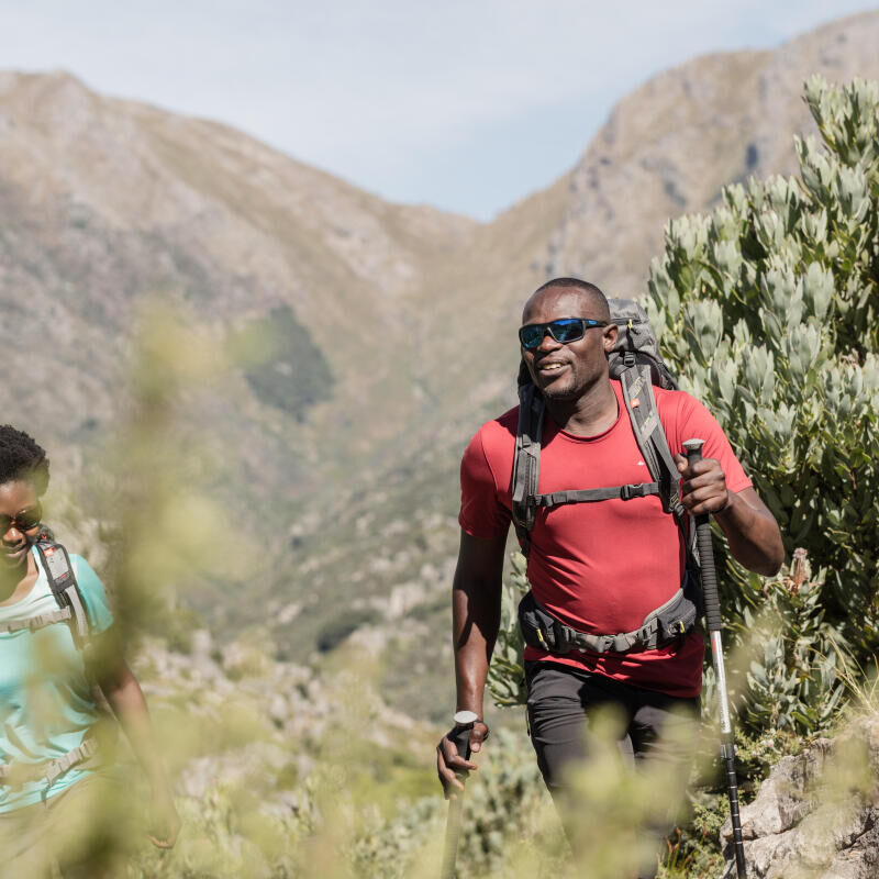 man hiking in the sun