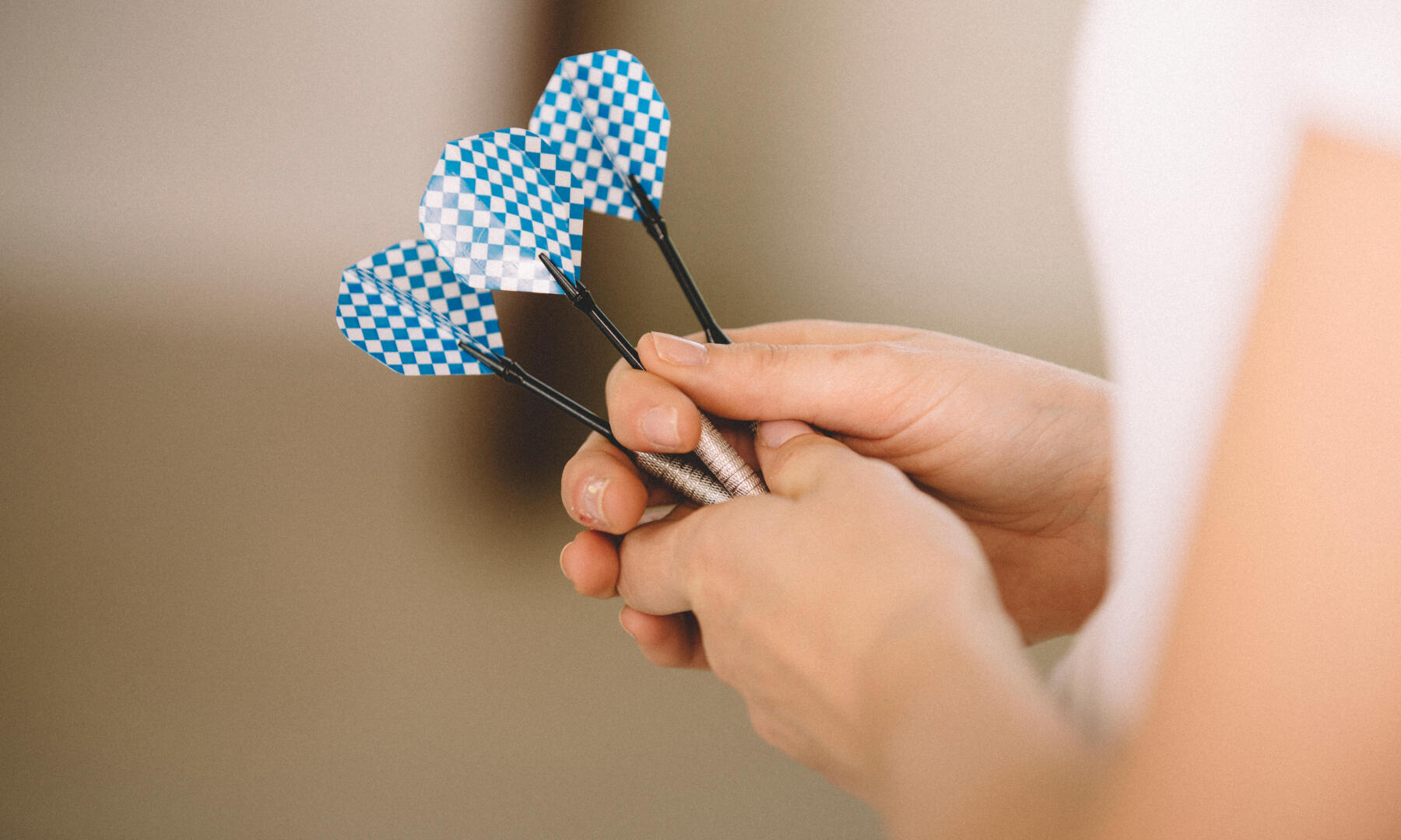 hands holding a set of arrows