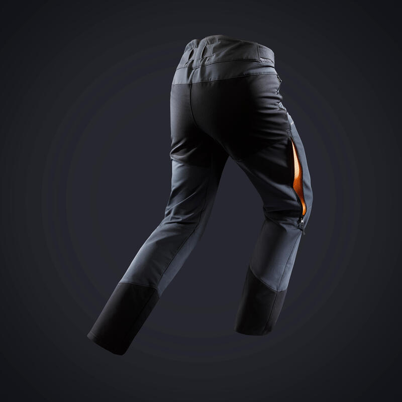 Pánské turistické vodoodpudivé strečové kalhoty s návleky SH520 X-warm