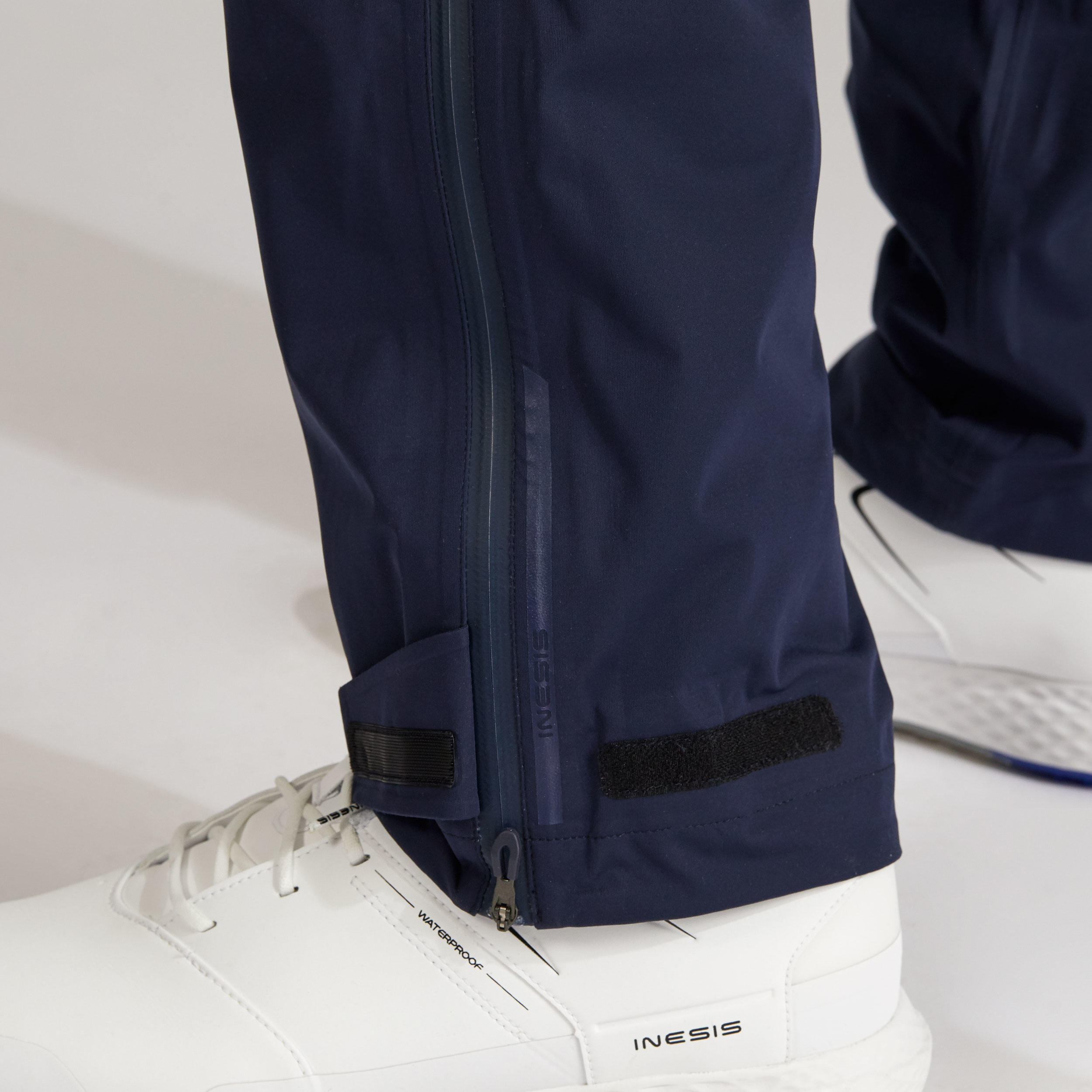 Pantalón golf lluvia Hombre Inesis RW500 azul marino 6/8