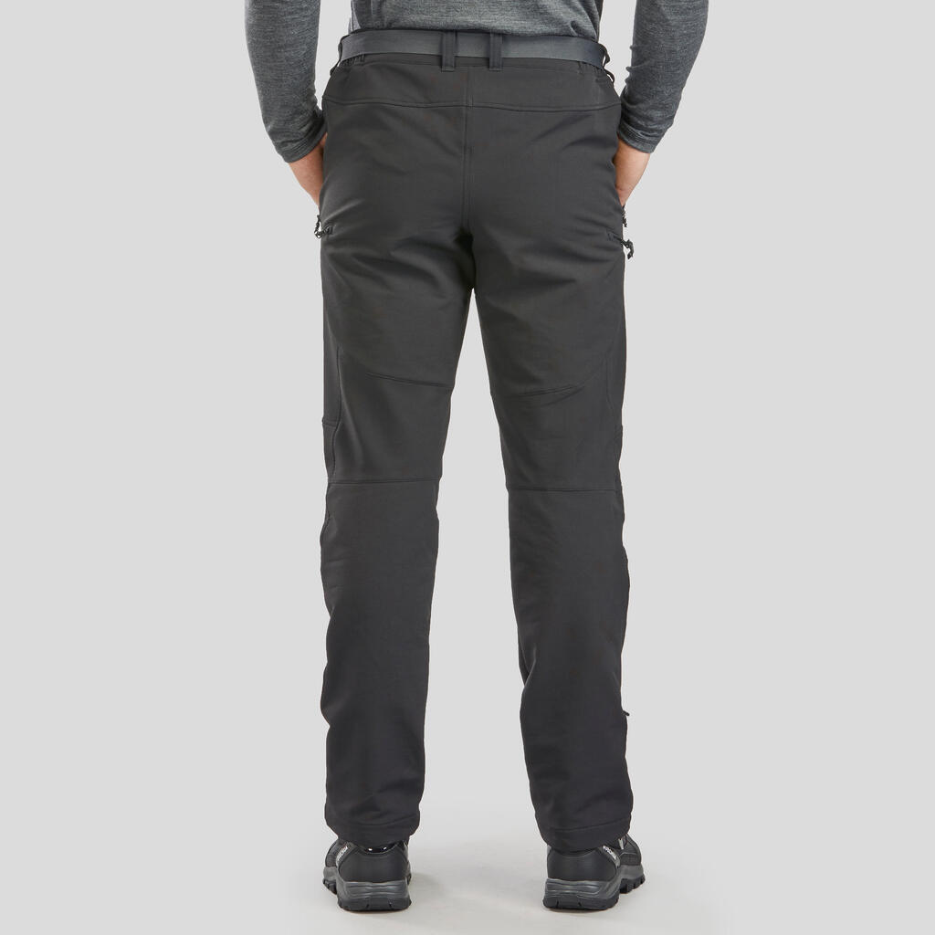 Pánske strečové nohavice SH500 X-Warm na zimnú turistiku hrejivé a vodoodpudivé
