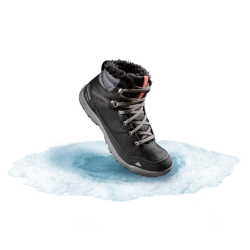 รองเท้าหุ้มข้อผู้หญิงสำหรับเดินป่าท่ามกลางหิมะที่มีคุณสมบัติกันหนาวและกันน้ำรุ่น SH100 WARM (สีดำ)