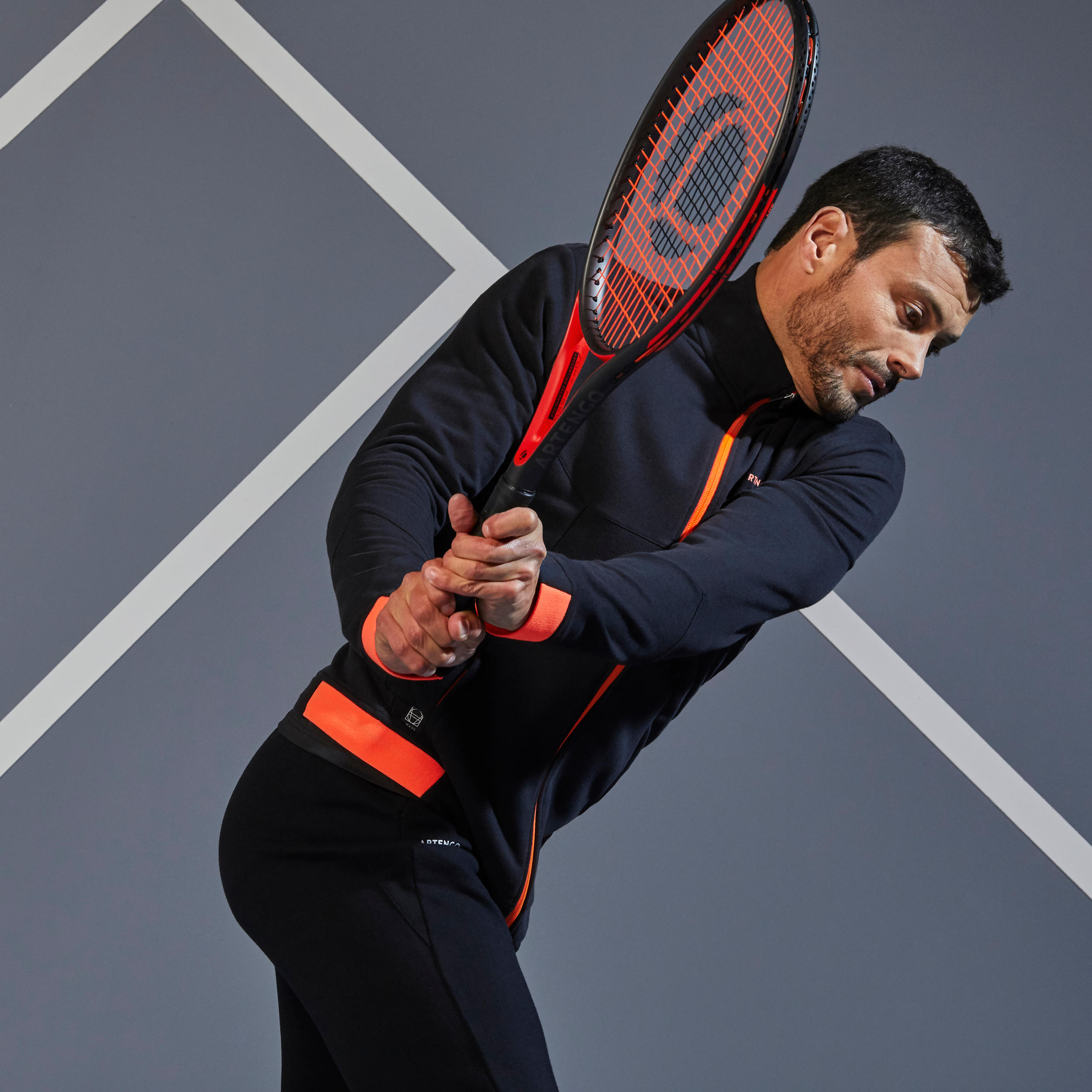 TJA500 Thermal Tennis Jacket - Black/Orange 6/20