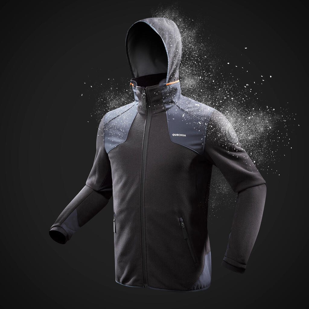 Chamarra cálida de tejido polar para senderismo negra para hombre SH500 MOUNTAIN