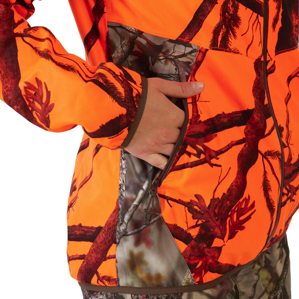 Dámska nehlučná a nepremokavá poľovnícka bunda 500 reflexná maskovacia