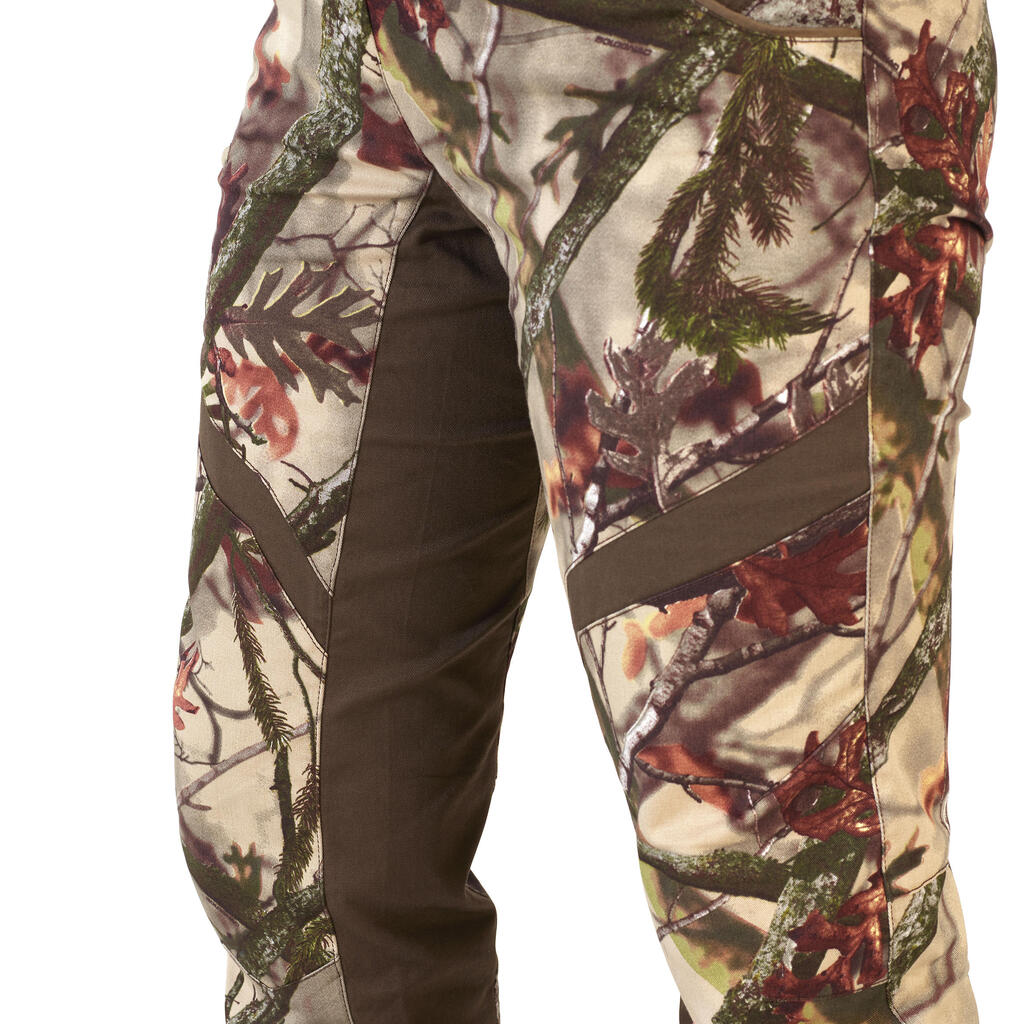 Dámske poľovnícke nohavice 500 nehlučné s maskovacím motívom lesa