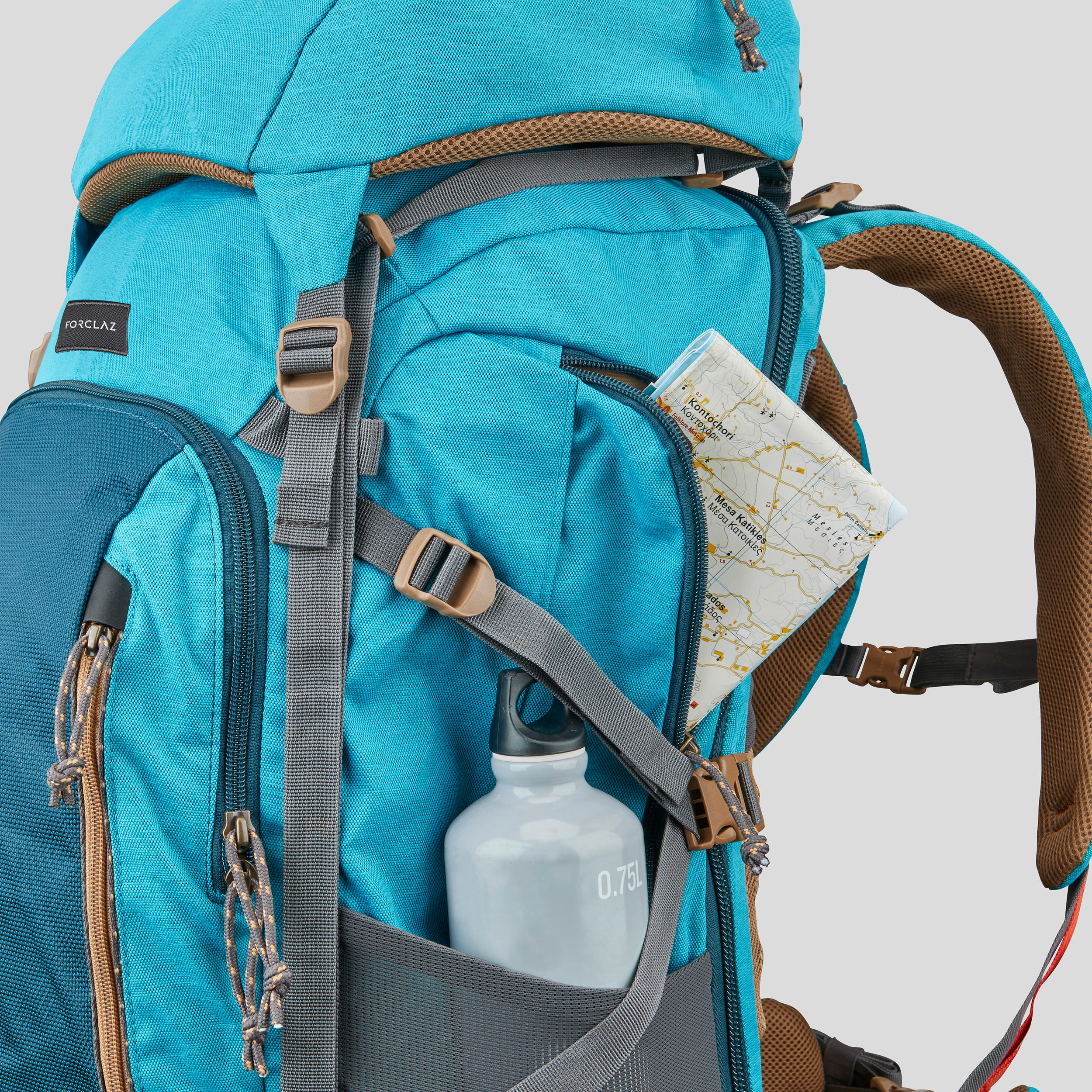 MOCHILA DE TREKKING Y MONTAÑA TRAVEL500 50 LITROS CELESTE - Decathlon