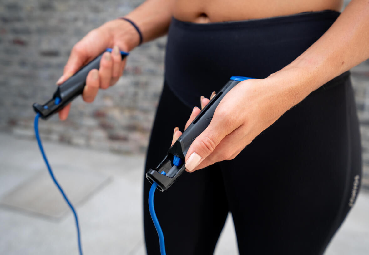 Woman holding a jump rope