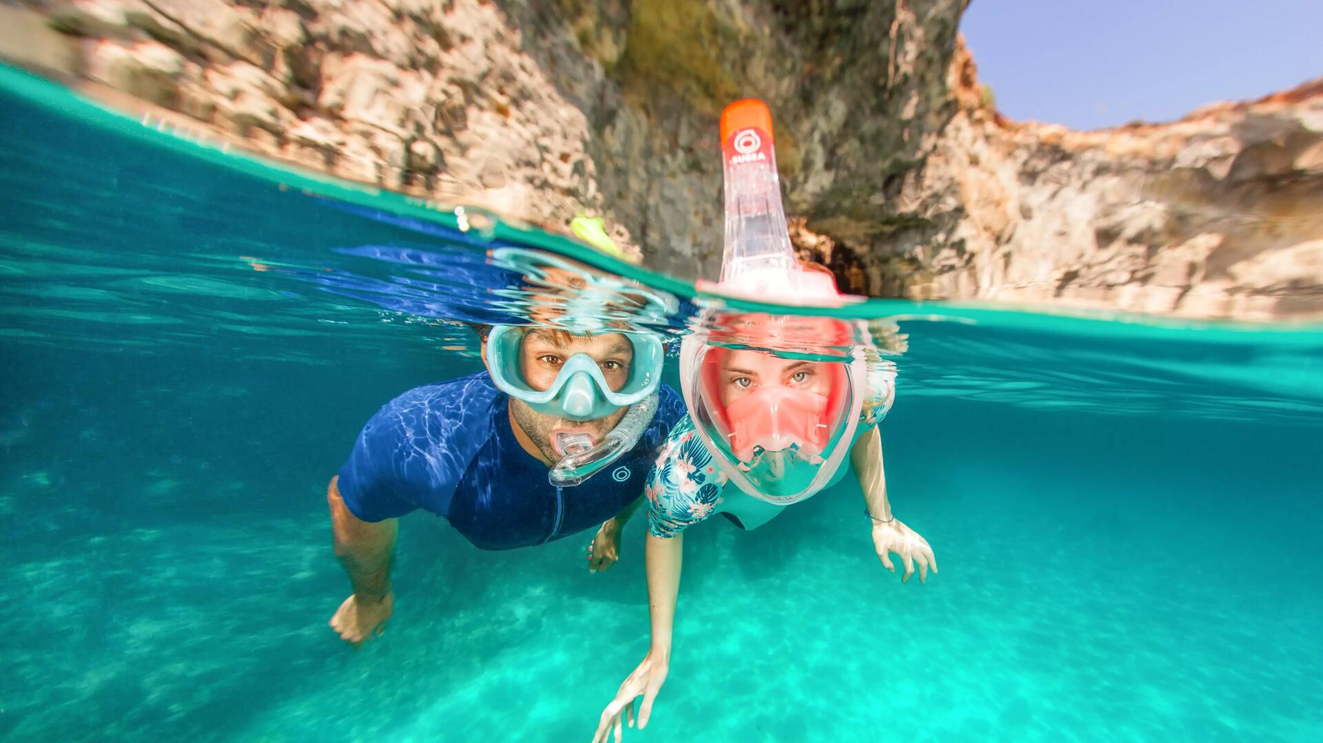 A couple underwater using Easybreaths.
