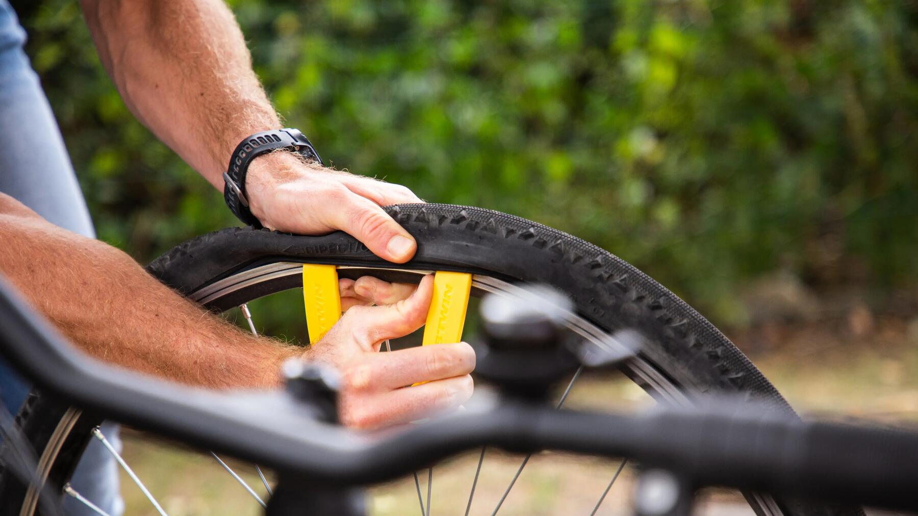 Man fixing a bike tyre