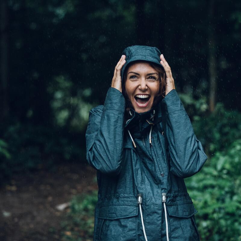 woman laughing in the rain