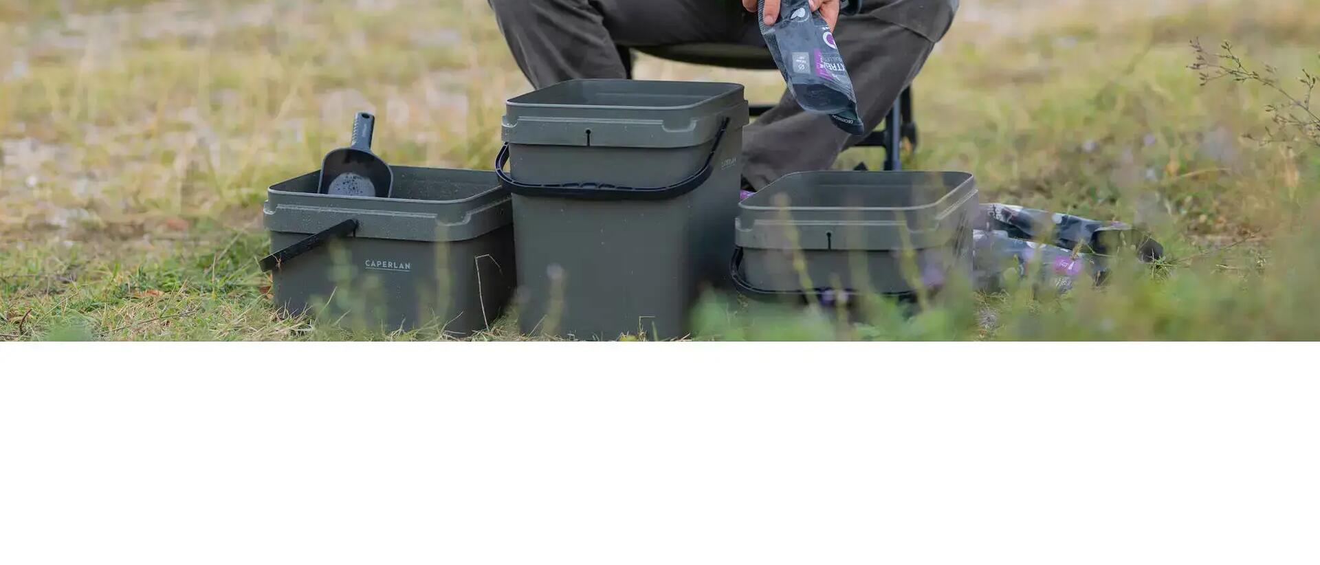 Man putting bait into boxes