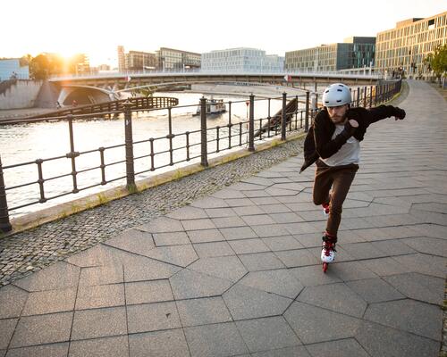 Man skating outside wearing helmet