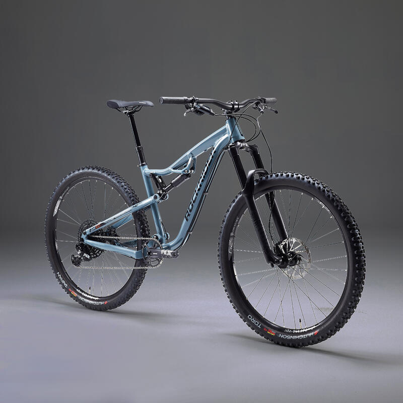 Bicicleta de montaña 29" doble suspensión aluminio 12 V Rockrider AM 100 S azul