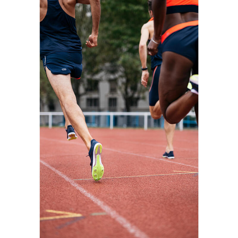 Atletiekschoenen met spikes halve afstand AT Mid blauw zwart en geel