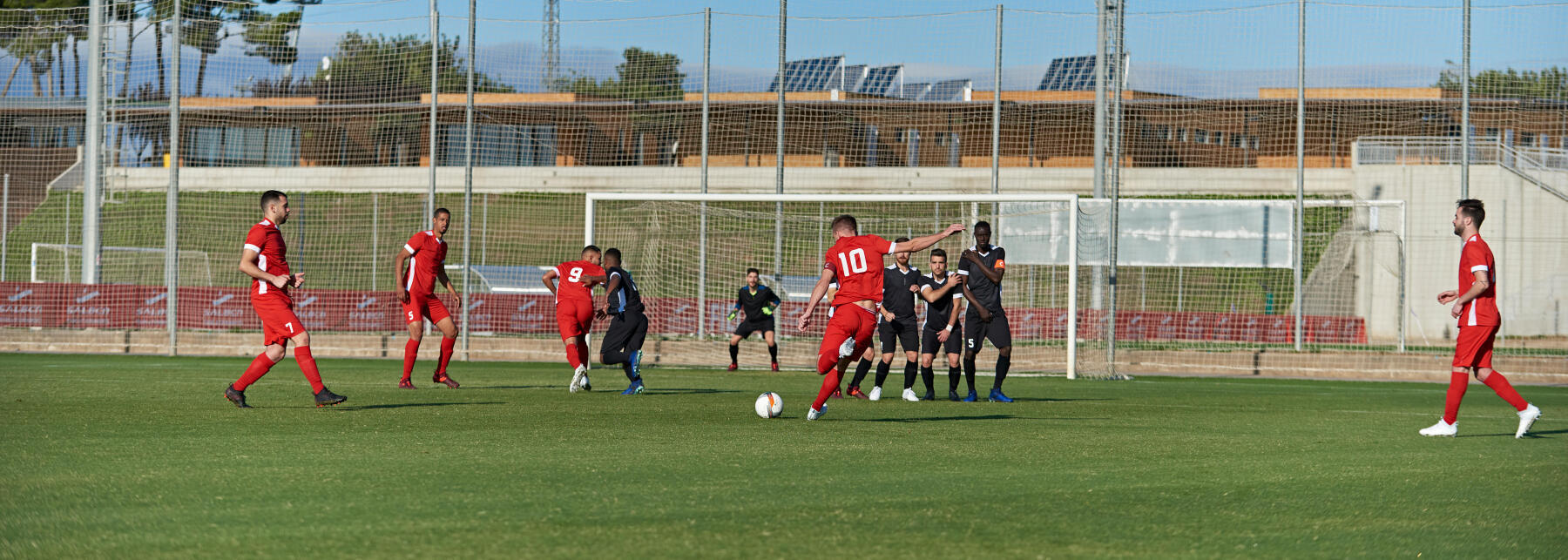 A Young Football Player Defending The Goal During A Traning