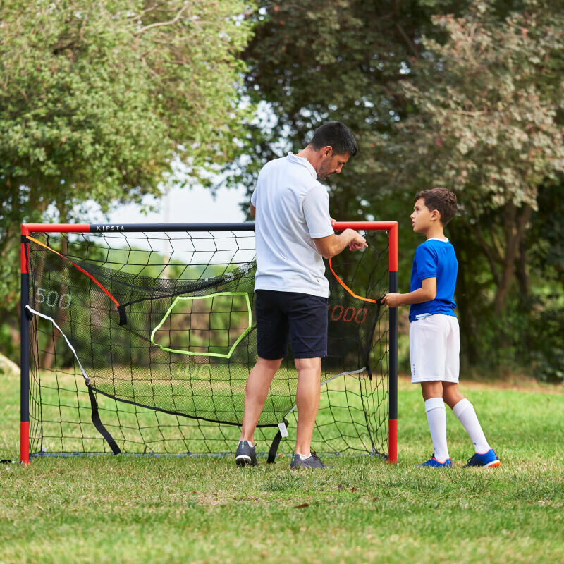 Coaching running with the ball with your child at home