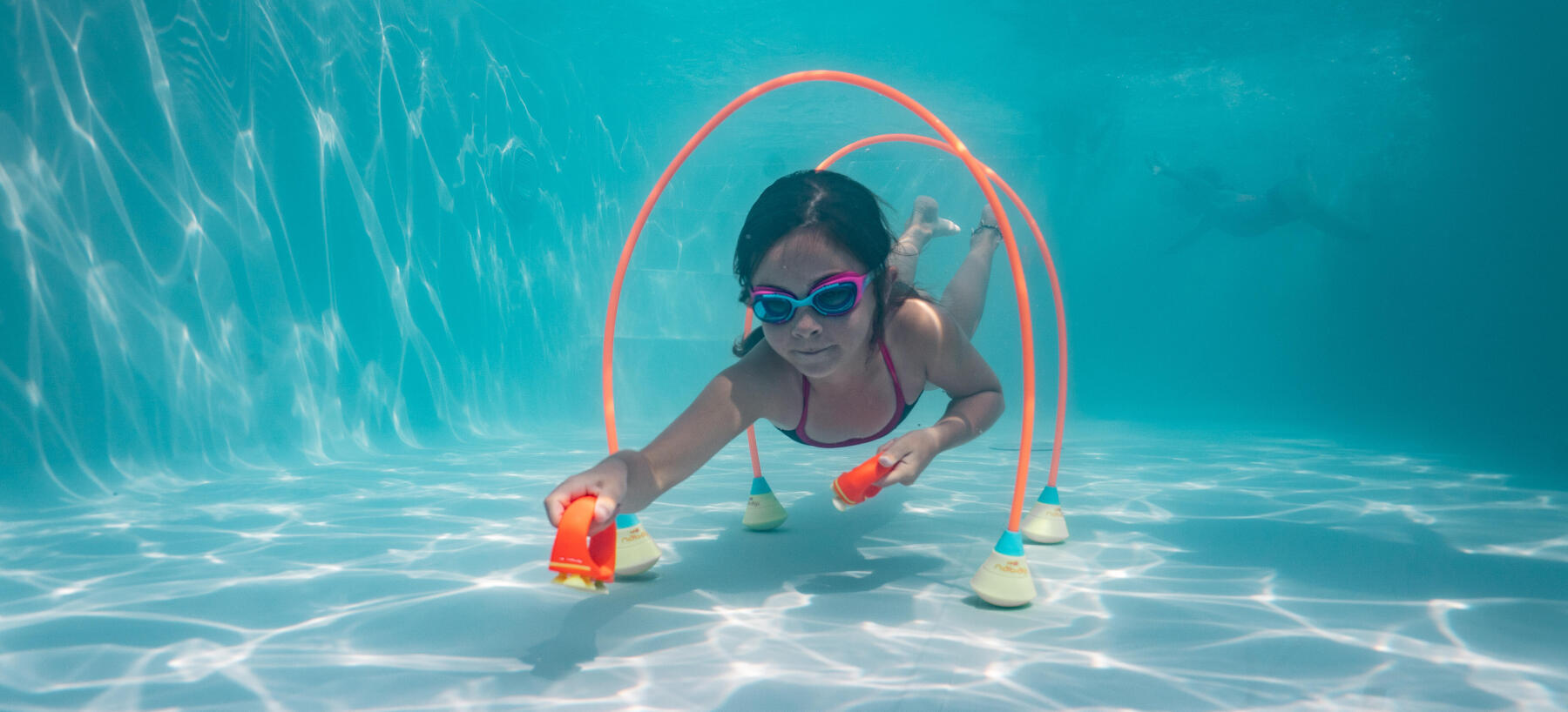 How can I help my child to learn to swim?