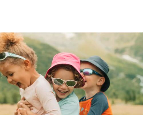 Kids with sunglasses playing in nature