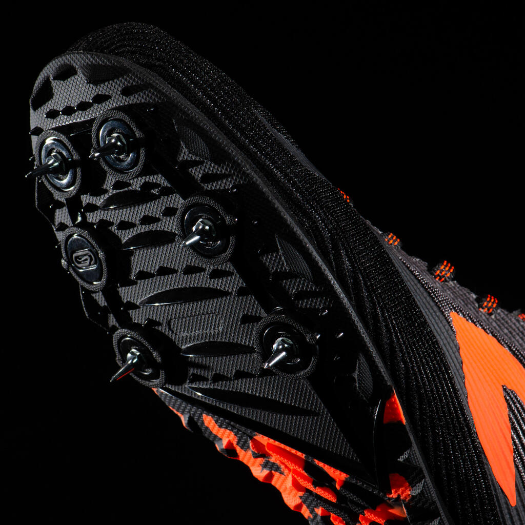 Vieglatlētikas distanču skriešanas apavi ar radzēm, melni/oranži