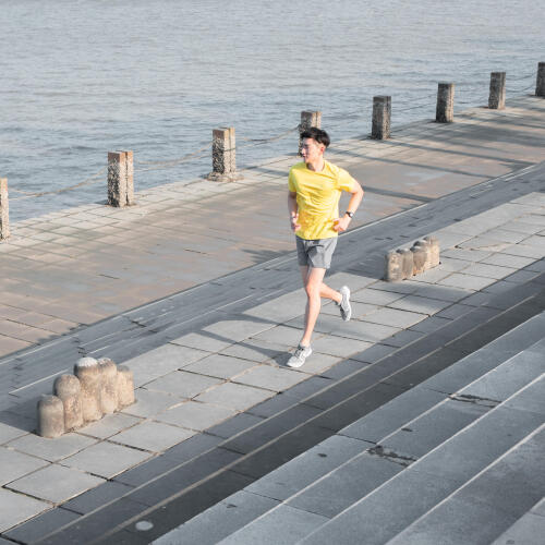 CALÇADO DE CORRIDA HOMEM KALENJI RUN 100 CINZENTO