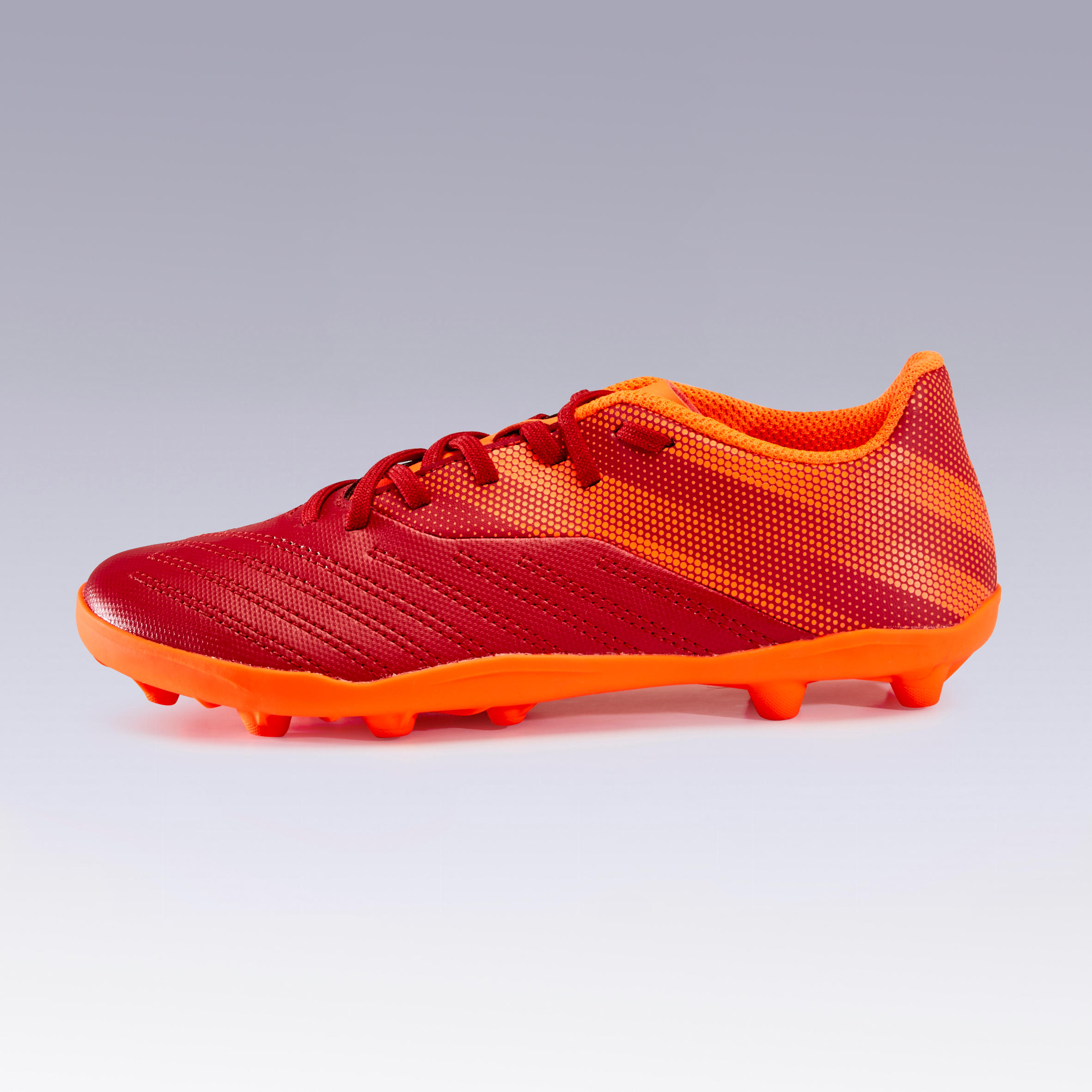 kids orange football cleats