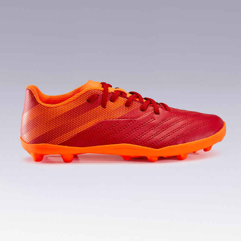 Botas de fútbol Niños Kipsta Agility 140 FG burdeos naranja