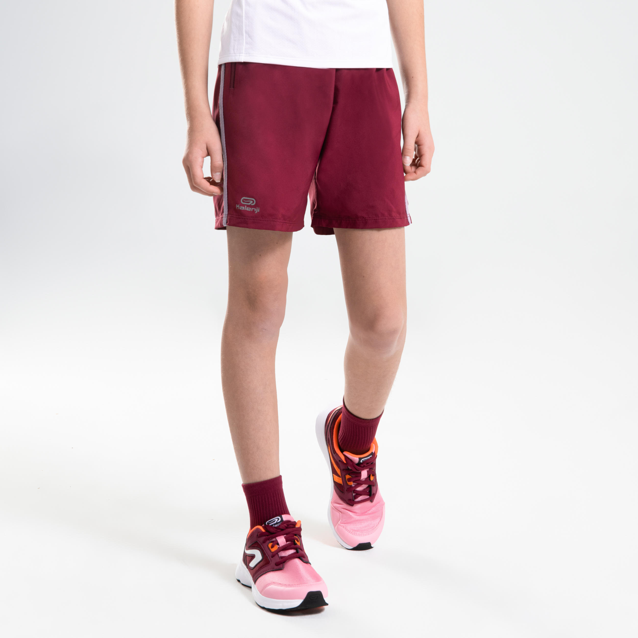 AT 100 KIDS' ATHLETICS BAGGY SHORTS - PURPLE 3/9