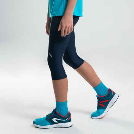 AT 100 KIDS' ATHLETICS CROPPED BOTTOMS - NAVY BLUE/TURQUOISE