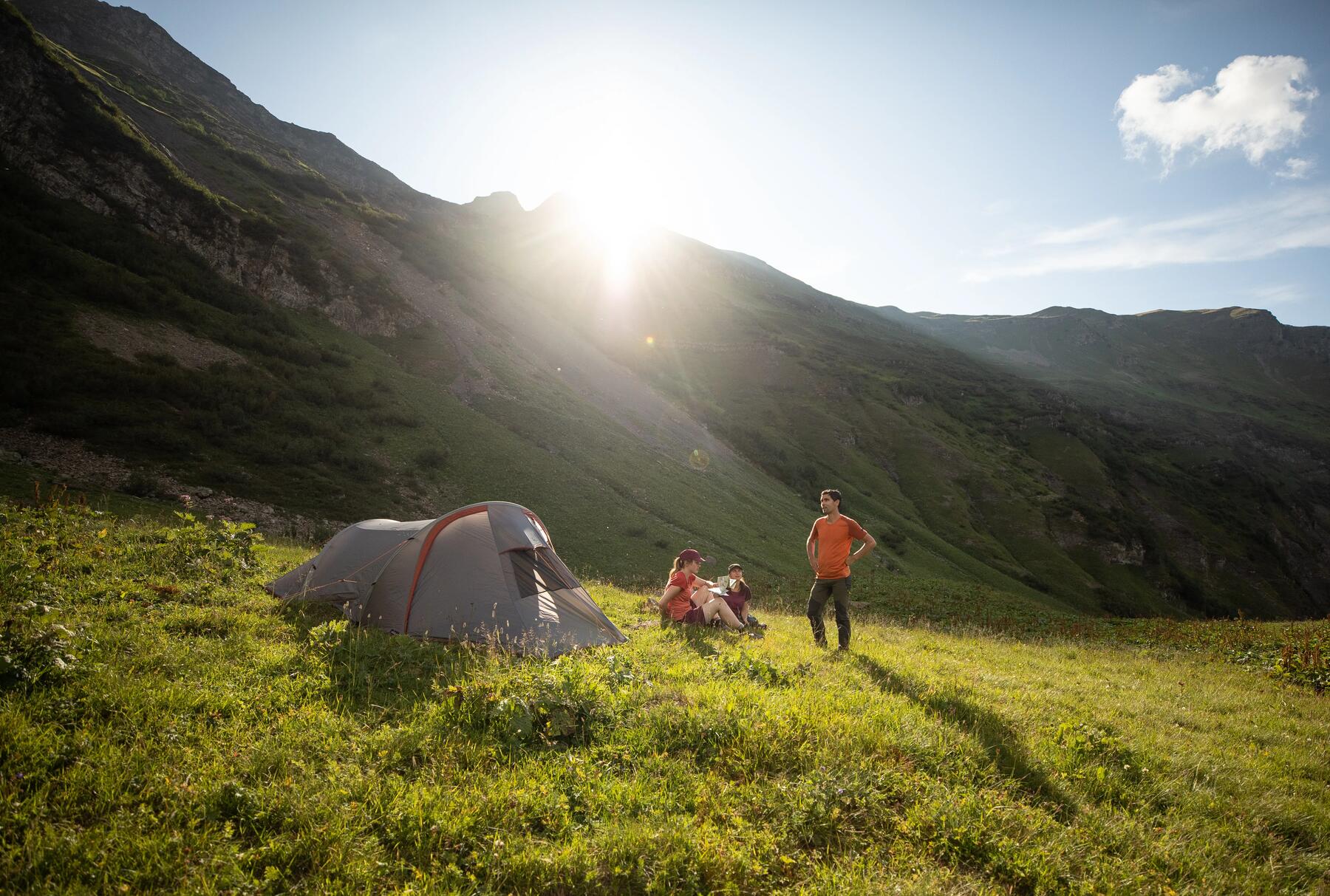 Group of people using a tunnel tent
