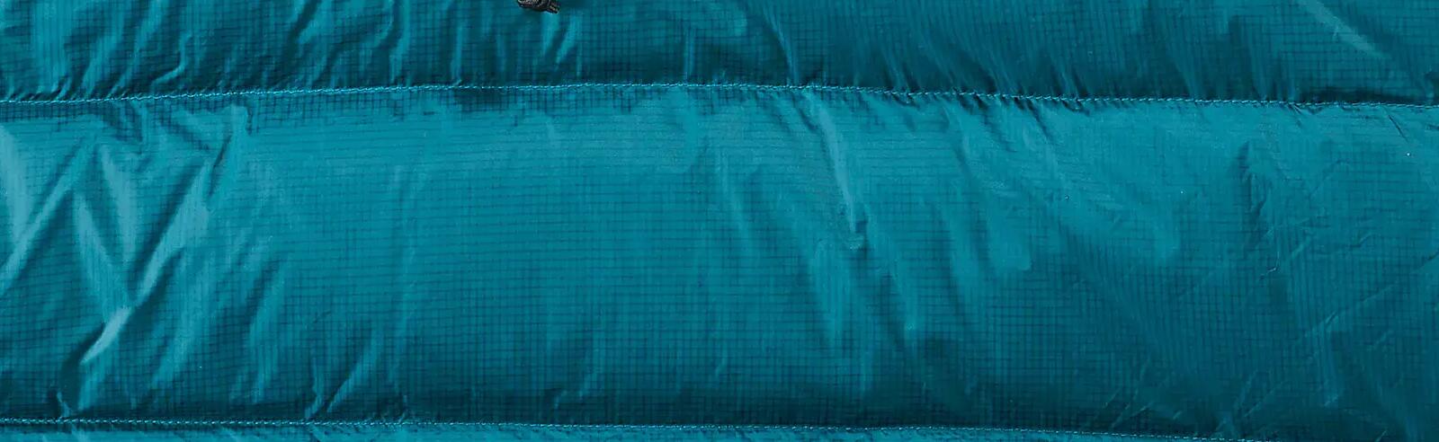 Como fazer a manutenção de um saco-cama de penas?