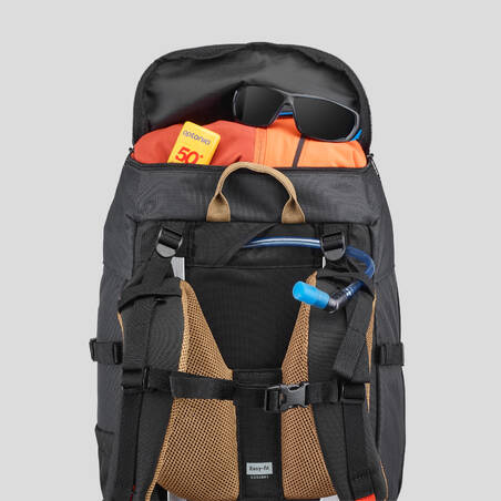 Ransel trekking gunung pria | TREK 100 Easyfit 50 L - hitam