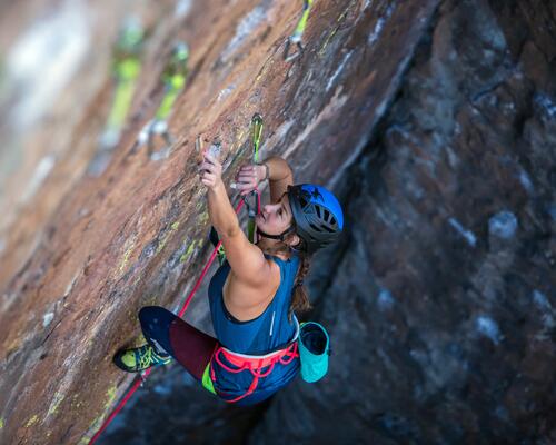 Woman climbing outdoors