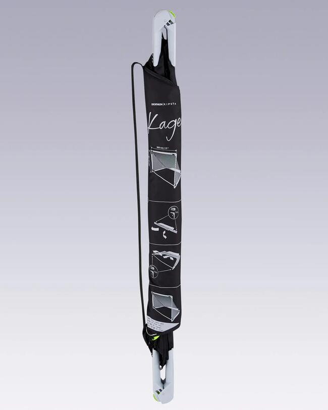 Estuche negro con bocetos y textos en blanco, muestra instrucciones, contiene elementos metálicos, diseño elegante.
