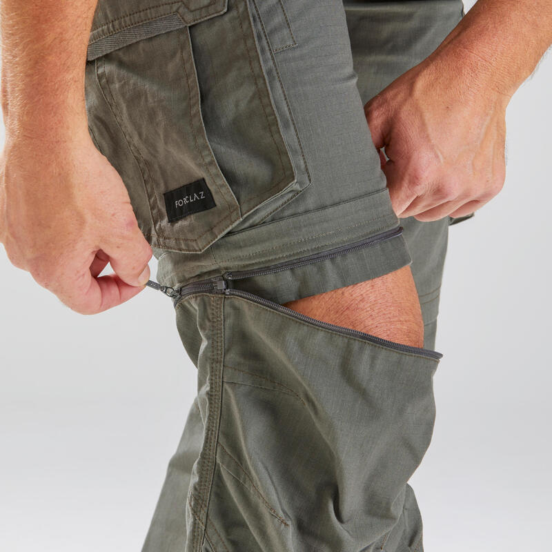 Pantalón desmontable montaña y trekking cargo Hombre Travel 100 caqui