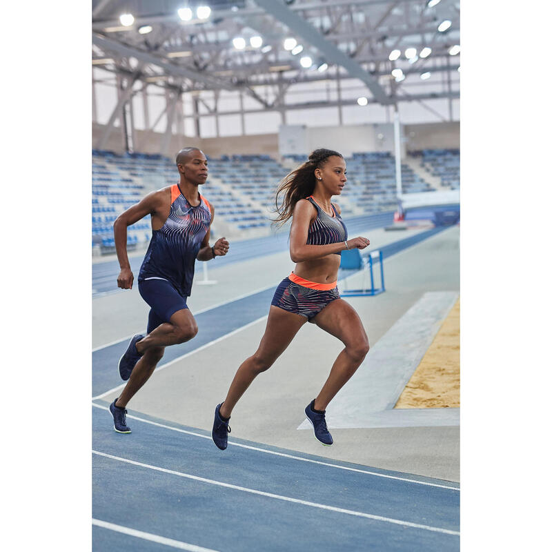 Atletiekschoenen met spikes halve afstand AT Mid blauw zwart en geel