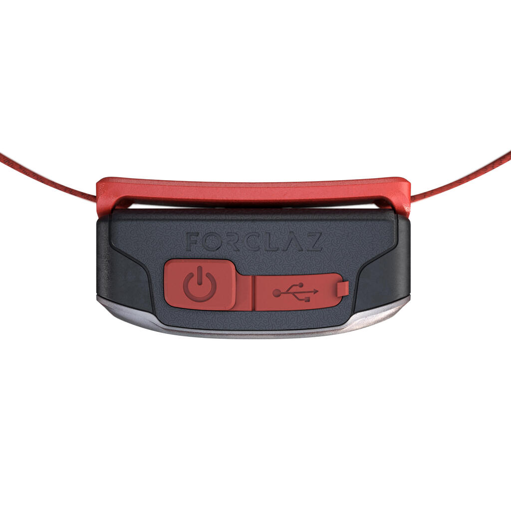 Linterna frontal de 100 lúmenes recargable usb para trekking 		Forclaz rojo