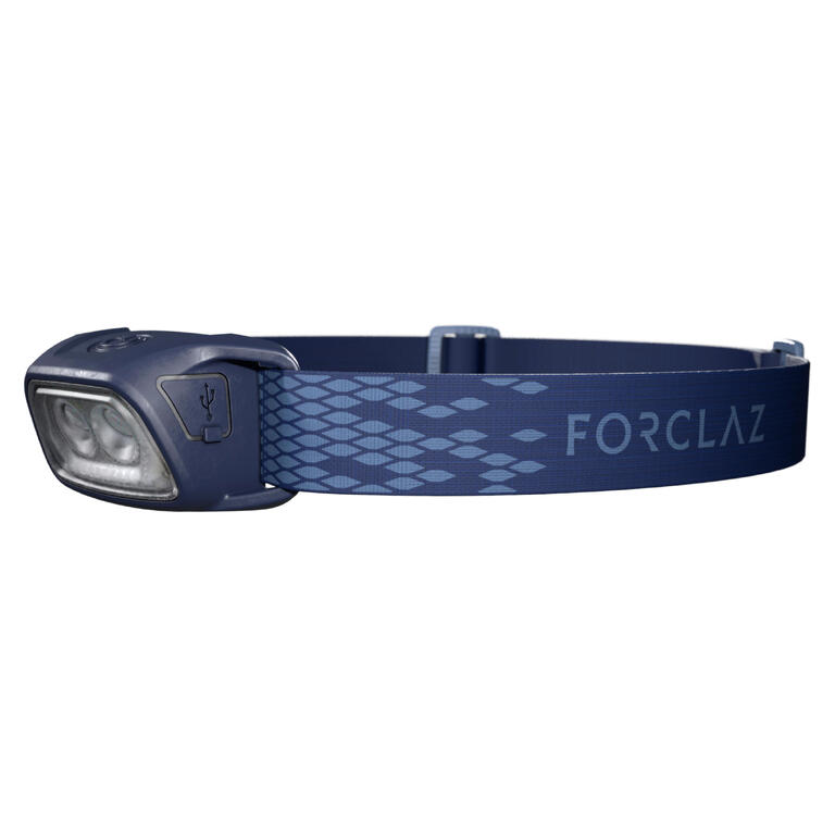 Blue Forclaz rechargeable trekking head torch with adjustable headband