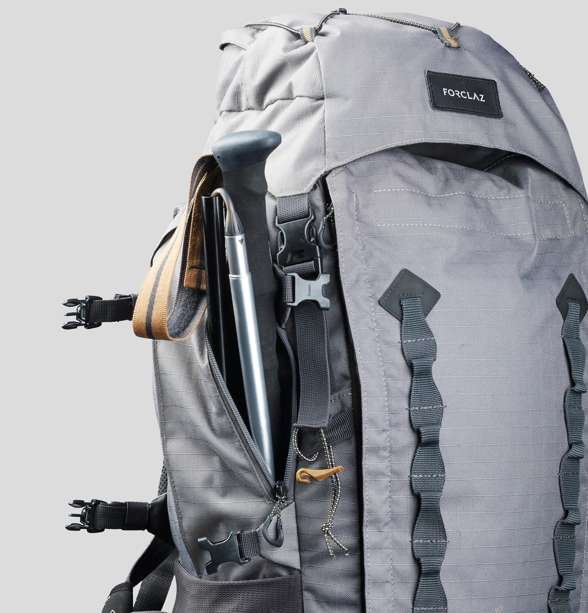 Where to hang your hiking poles on a backpack