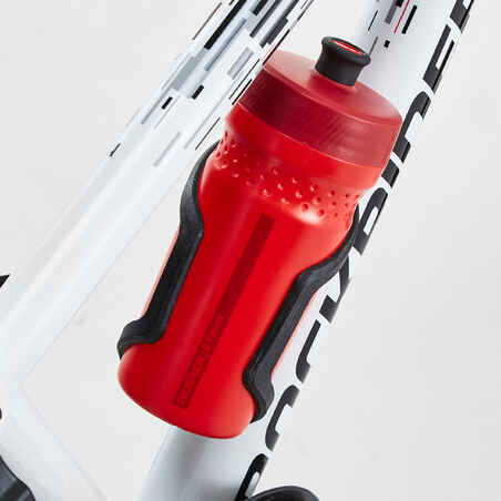 Frame-mounted bottle cage with side opening for a 380ml bottle.