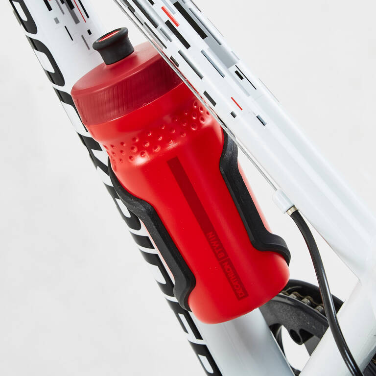 Frame-mounted bottle cage with side opening for a 380ml bottle.