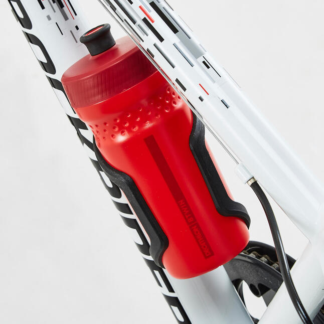 Framemounted bottle cage with side opening for a 380ml bottle. BTWIN
