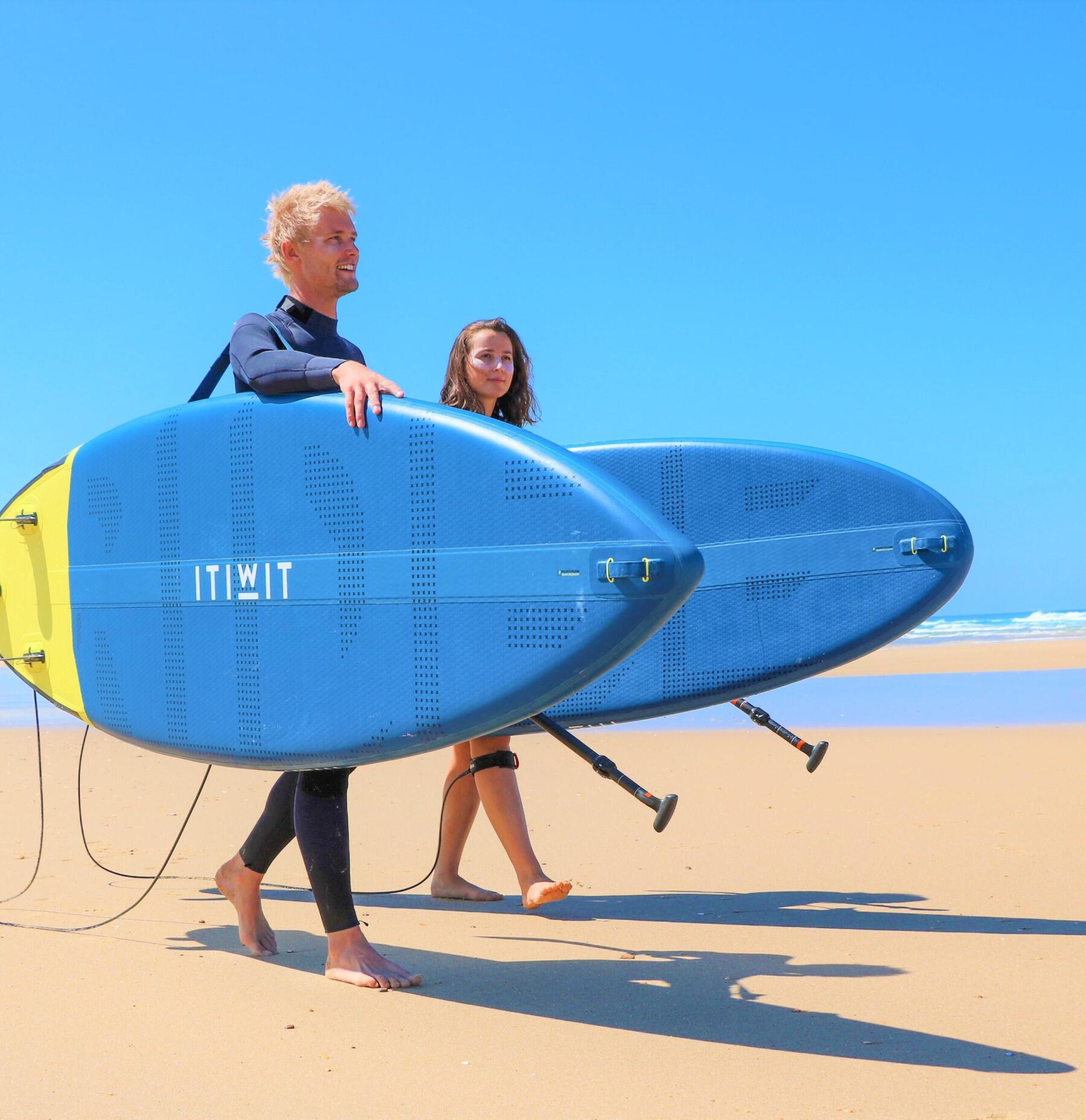 Stand on surfboard with shop paddle