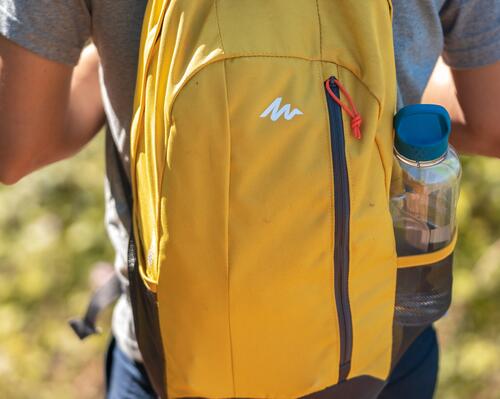 Backpack with plastic water bottle