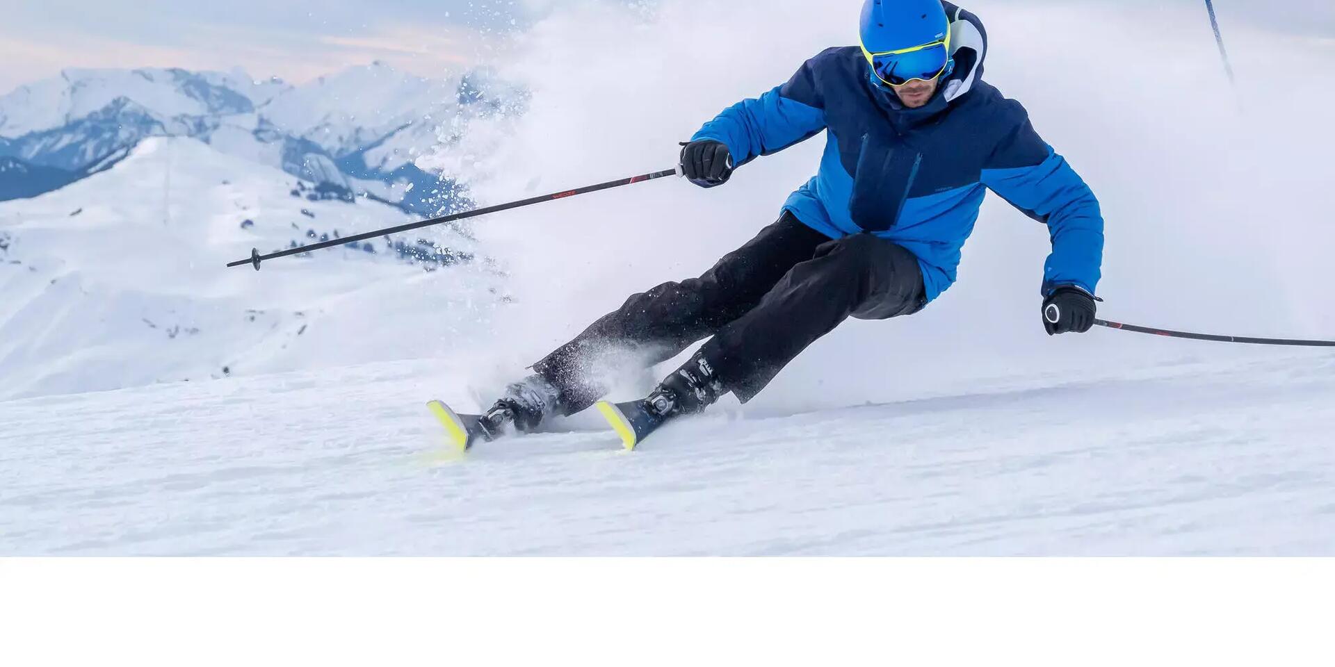 An expert skier making a sharp turn