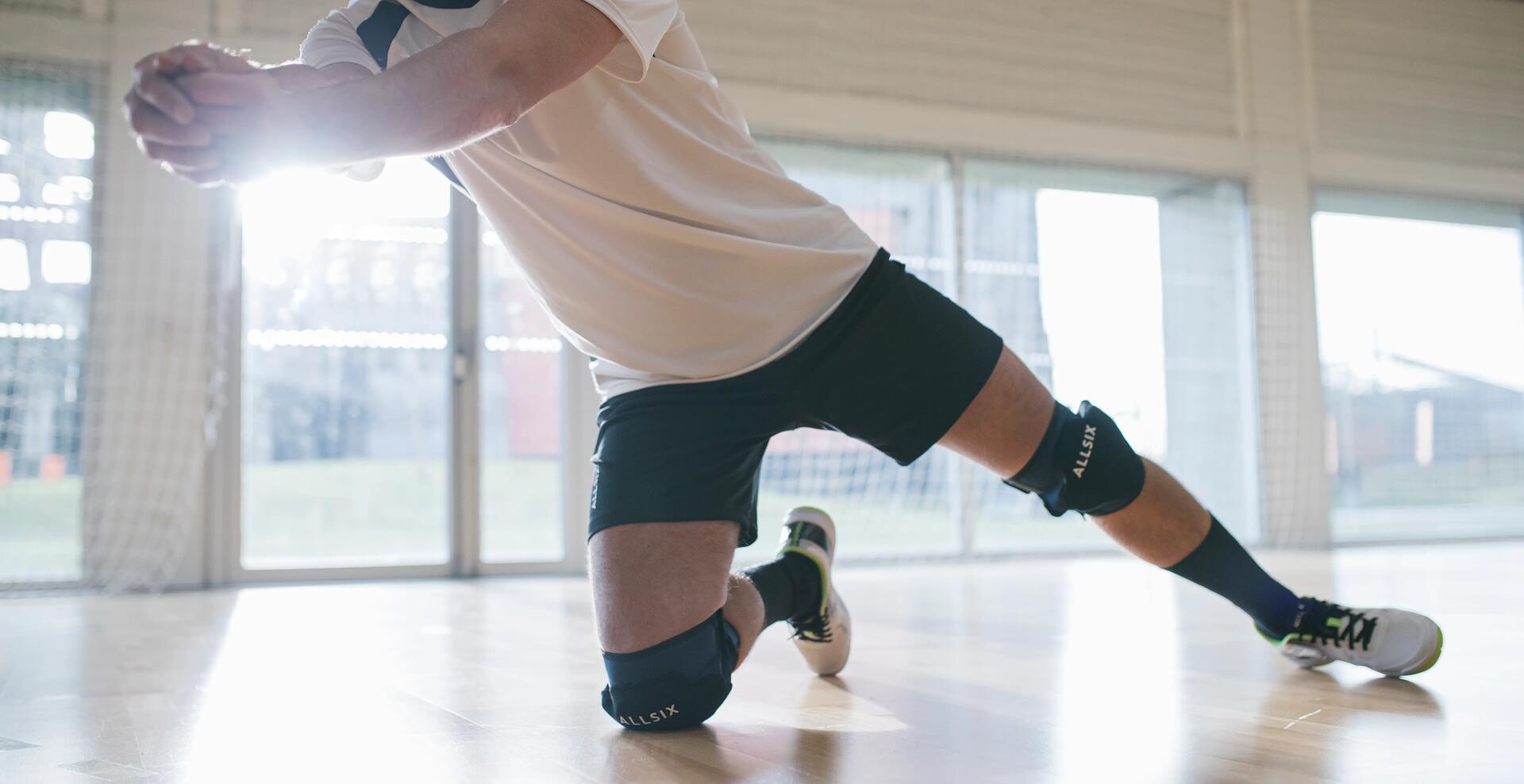 joueur de volley-ball avec genouillères