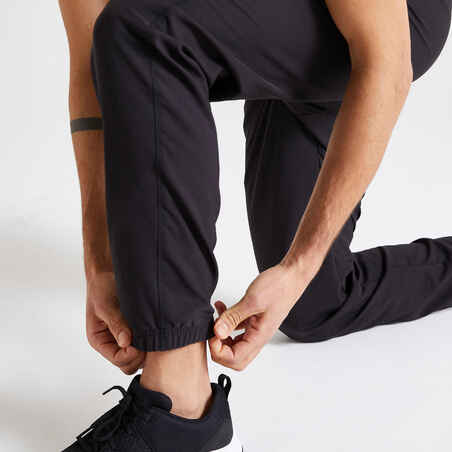 מכנסי כושר נושמים בגזרה רגילה לגברים, דגם Essential - שחור